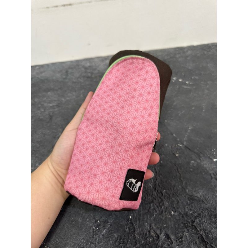 

Demon Slayer: Kimetsu no Yaiba Kotak Pensil Motif nezuko official merchandise