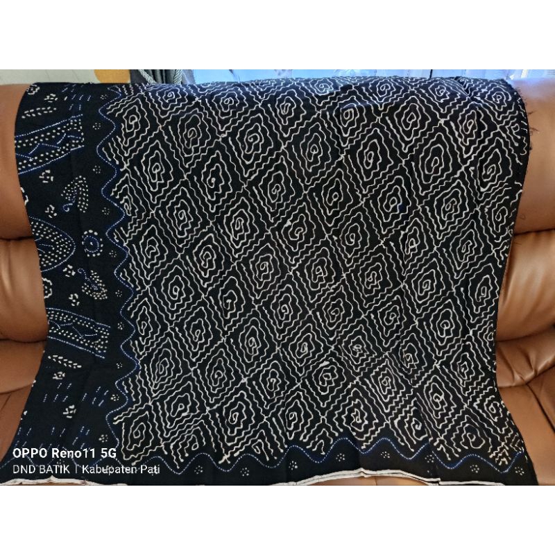 SARUNG BATIK TULIS BAKARAN MOTIF MEGA MENDUNG