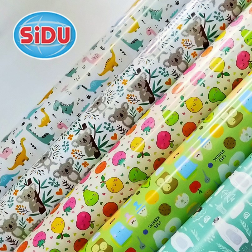 

kertas kado fancy dan batik sinar dunia per 5 lembar