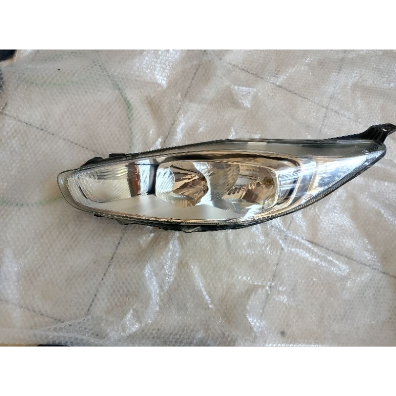 headlamp ford fiesta original 100%