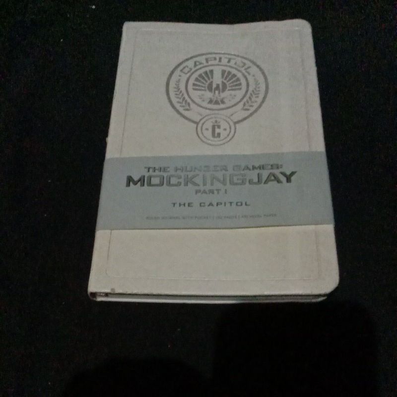 

Ruled journal with pocket,Archival paper,The Hunger games Mockingjay part 1,the Capitol new