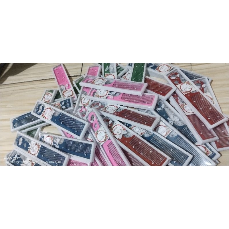 Souvenir sisir besar