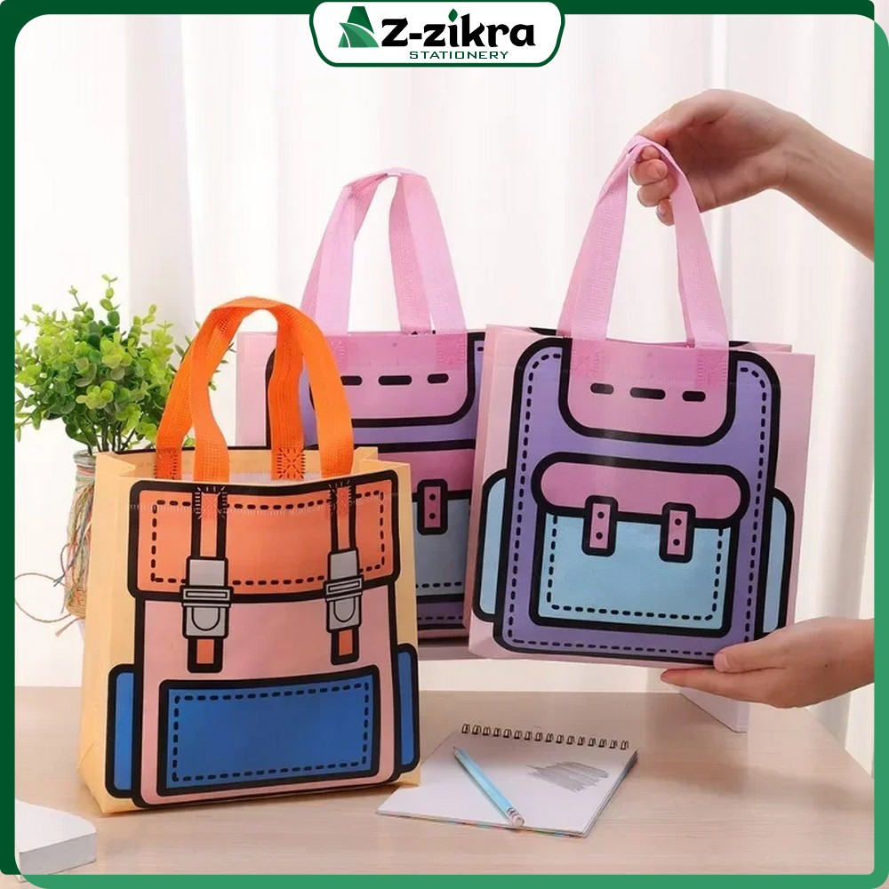 

Goodie Bag Non Woven Anti Air Motif Tas Sekolah Lucu Uk. 22x22x9cm / Tas Hampers Hand Bag Ulang Tahun Snack Bag Packaging Lipat Eco Friendly Bag Az Zikra Stationery T59