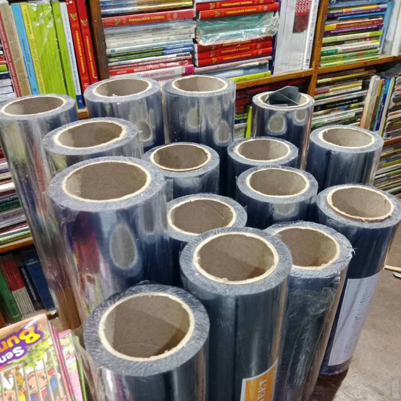 

HJK Sampul Buku Plastik Mika Bening Roll Besar Ukuran 25cm,27cm,30cm,34cm,40cm Panjang 45 meter
