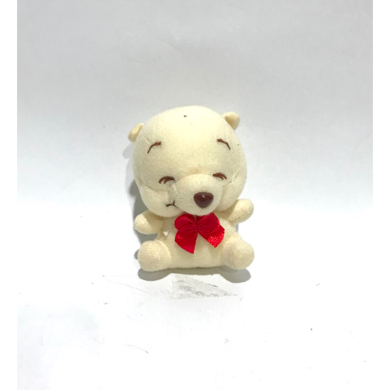 Boneka beruang pooh kecil