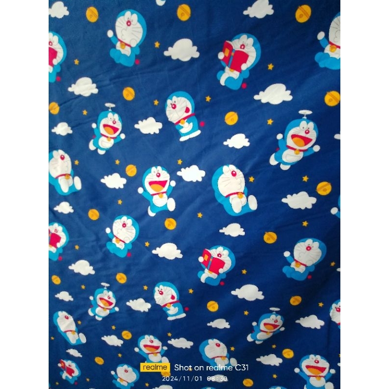 bahan kain sprei meteran motif karakter