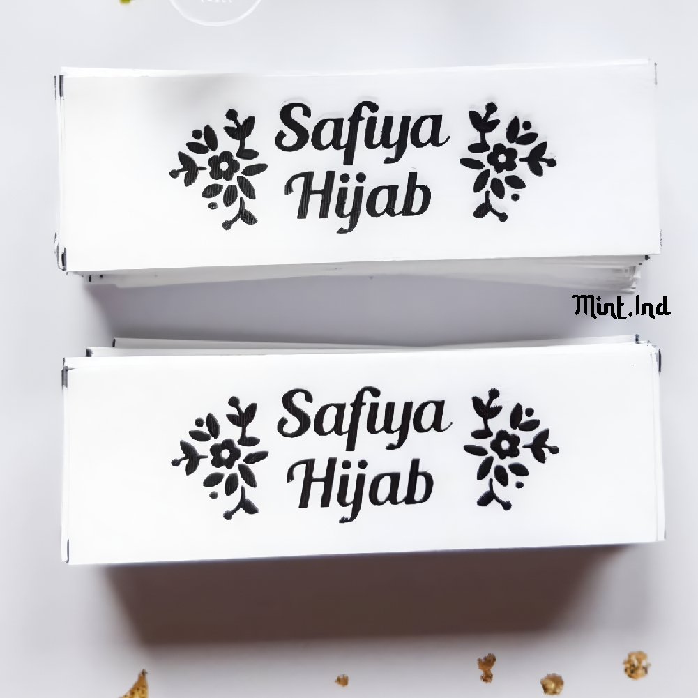 

Mint.ind Label Satin 1 Roll 50 Pcs Label Baju / Label Hijab / Label Woven Damask Subtitute