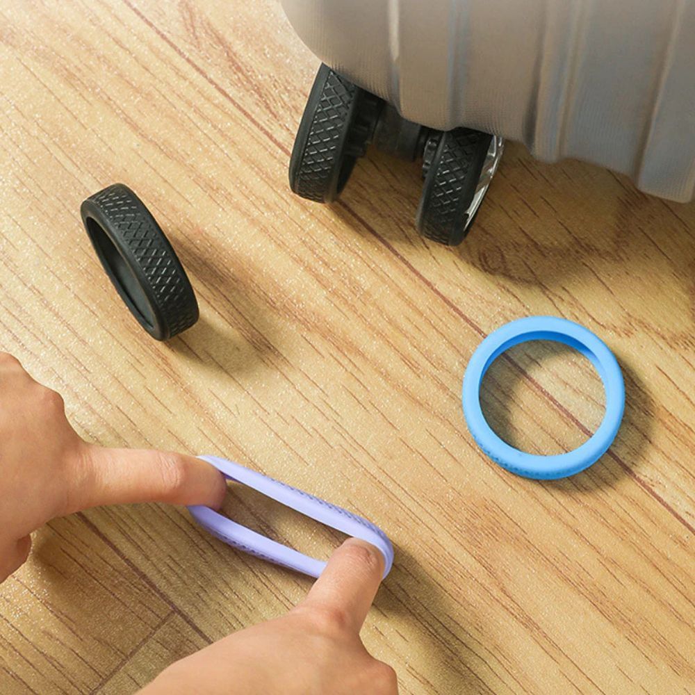 Roda Karet Silikon Koper Isi 4 pcs Roda Karet silikon Universal elastis bisa disesuaikan pada roda manapun seperti koper, roda kursi dan lain lain
