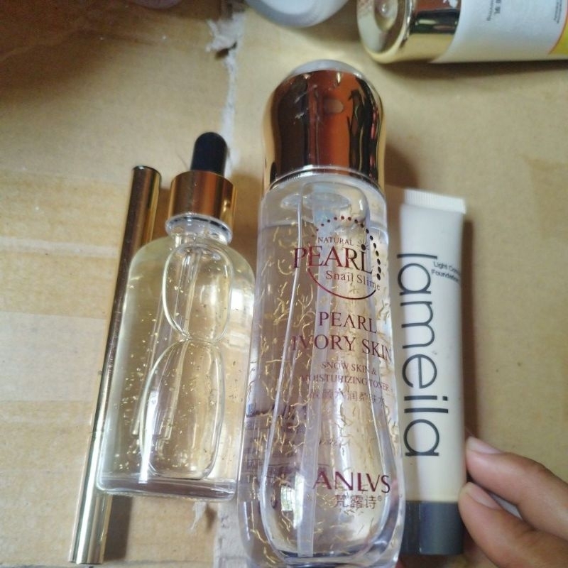 pearl whitening hongkong toner.serum gold 50ml.foundation lamei warna tan natural .eyeliner waterpro