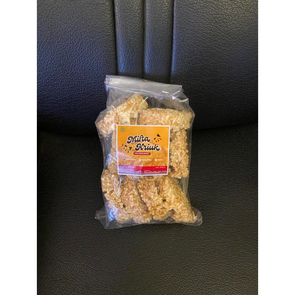 

KERUPUK KRUPUK RENGGINANG TERASI MATANG - 125GRAM