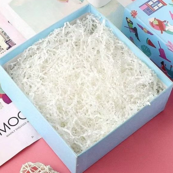 

Kertas Serut Putih/Doorslag | Kertas Cacah Hampers 100 gr