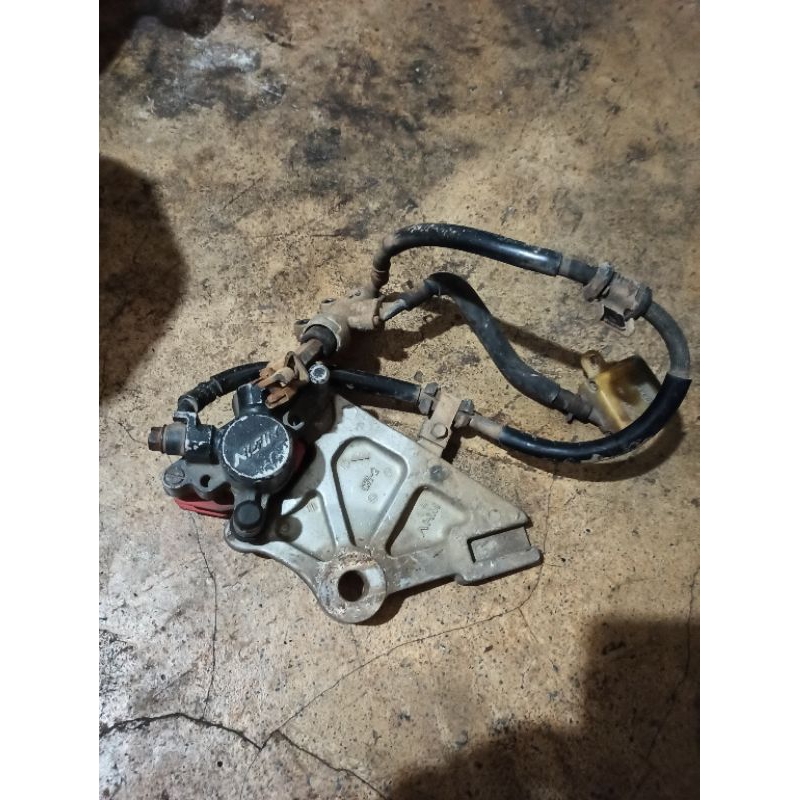 rem belakang tiger revo