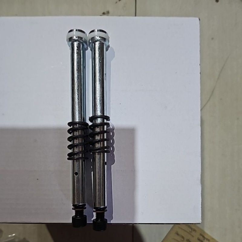 suling shock depan supra