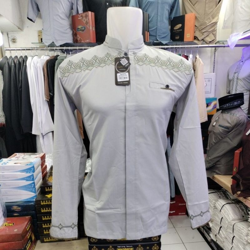 KOKO LENGAN PANJANG WARNA LENGAN OBLONG merek syahdika