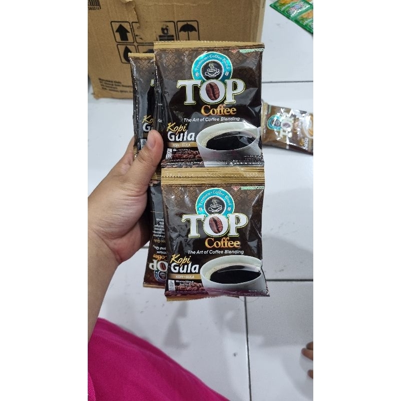 

Top Coffee Susu / Top Coffee Gula. Satu renteng isi 12pcs