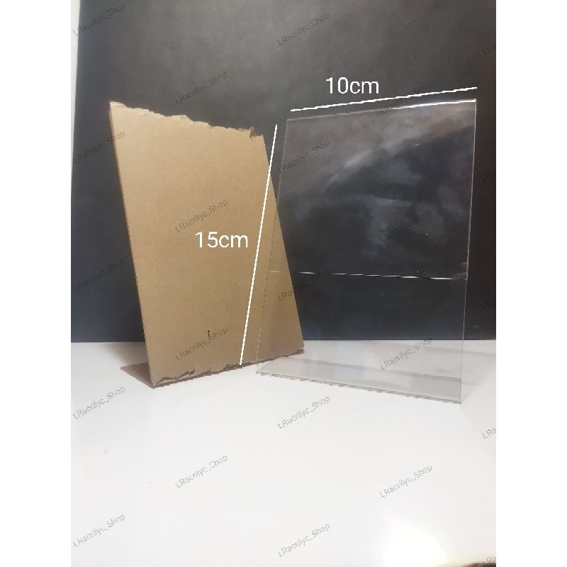 

AKRILIK TEMPAT BROSUR/TENT HOLDER/TENT CARD UKURAN A6 10X15CM MODEL POTRAIT L