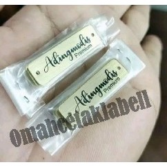 

LABEL PLAT HIJAB BAHAN KUNINGAN HARGA PER 100 PCS FREE DESAIN NAMA DAN LOGO