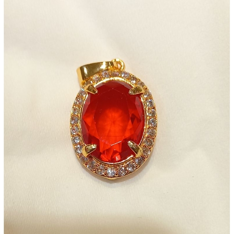 liontin batu merah siam