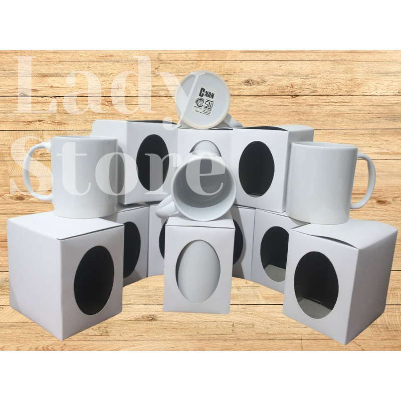

Dus Mug Lubang Oval Samping Bahan Duplek 270 Gsm ( Box dus mug souvenir )