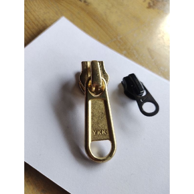 kepala Resleting no.10 YKK original warna emas