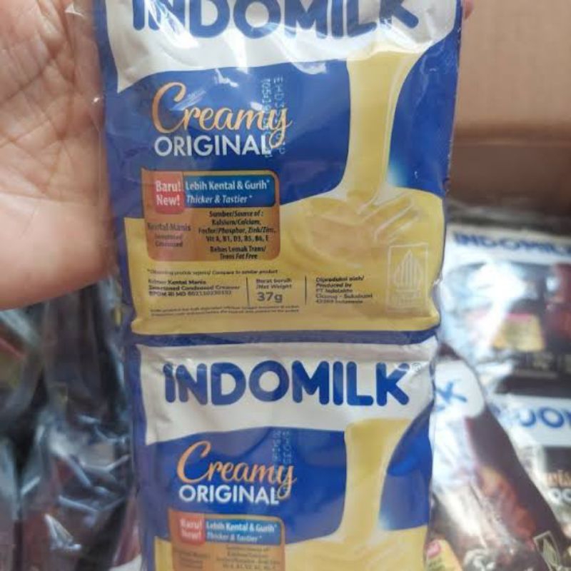 

Susu Indomilk Putih sachet SKM Putih susu kental manis putih 1 renteng isi 6 bungkus