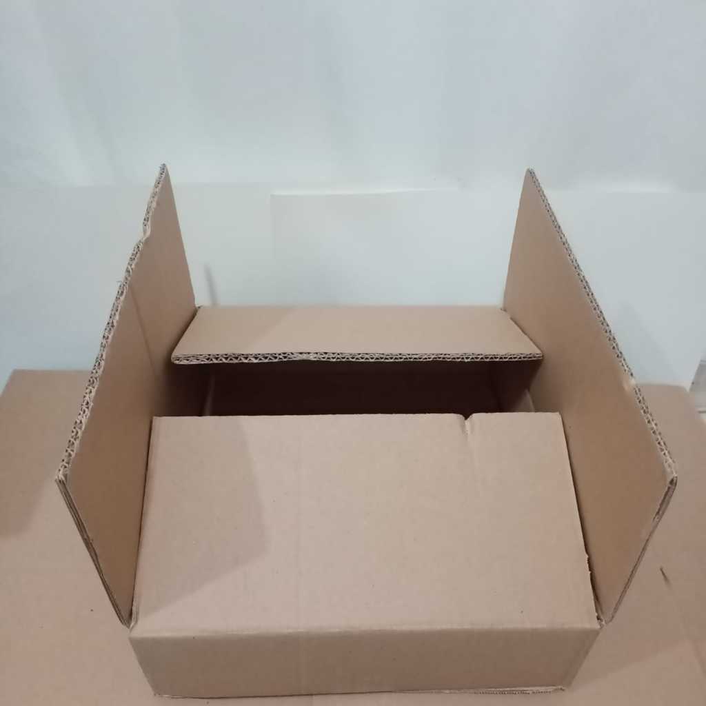 

Kardus Packing Double Wall Uk. P34 cm x L31 cm x T9.5 cm - K125/M125x3/K125