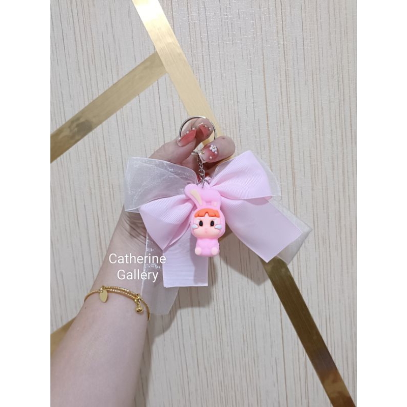 Gantungan Kunci Pita Baby Cry Again / Gantungan Tas Baby Cry Again