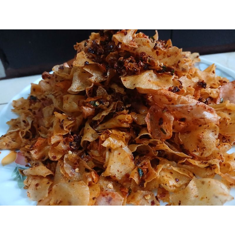 

Kripset kriwil 500gr Keripik SINGKONG pedas aroma daun jeruk by Amira Snack