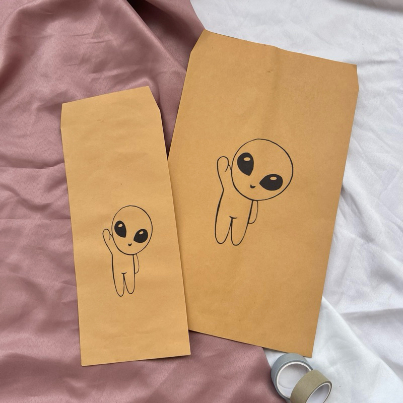 

Packaging Amplop Coklat motif Alien
