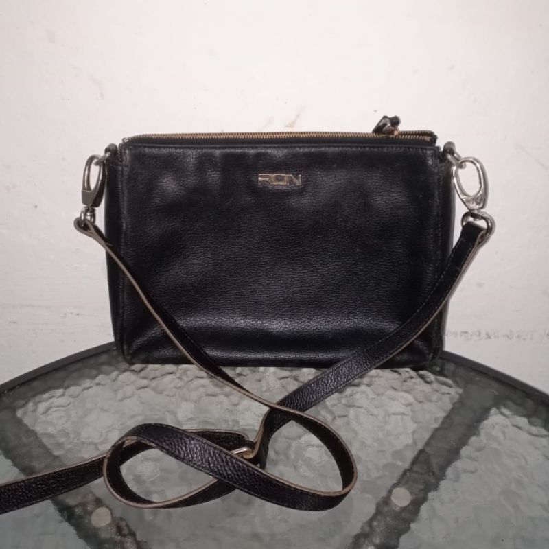 Fion original leather sling woman bag