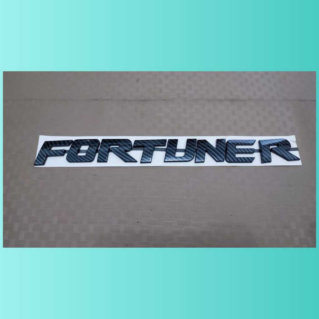 emblem kap mesin tulisan fortuner warna carbon