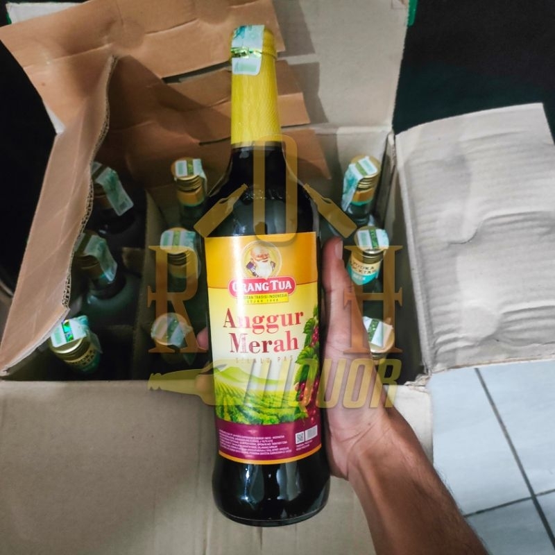 

PERISA SINTETIK BUAH ANGGUR TJAP AMG ( I 9, 7 % / 6 2 O ml)