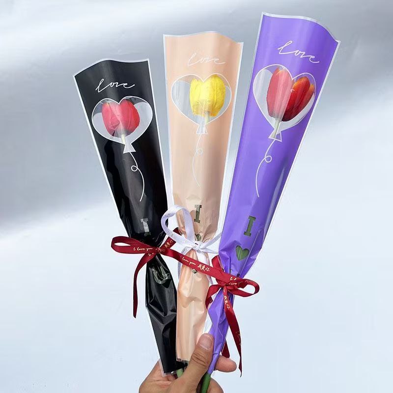 

Plastik Untuk Bunga Mawar Edisi Valentine i Love U 1 tangkai (ecer per lembar) untuk Mini Buket Rose