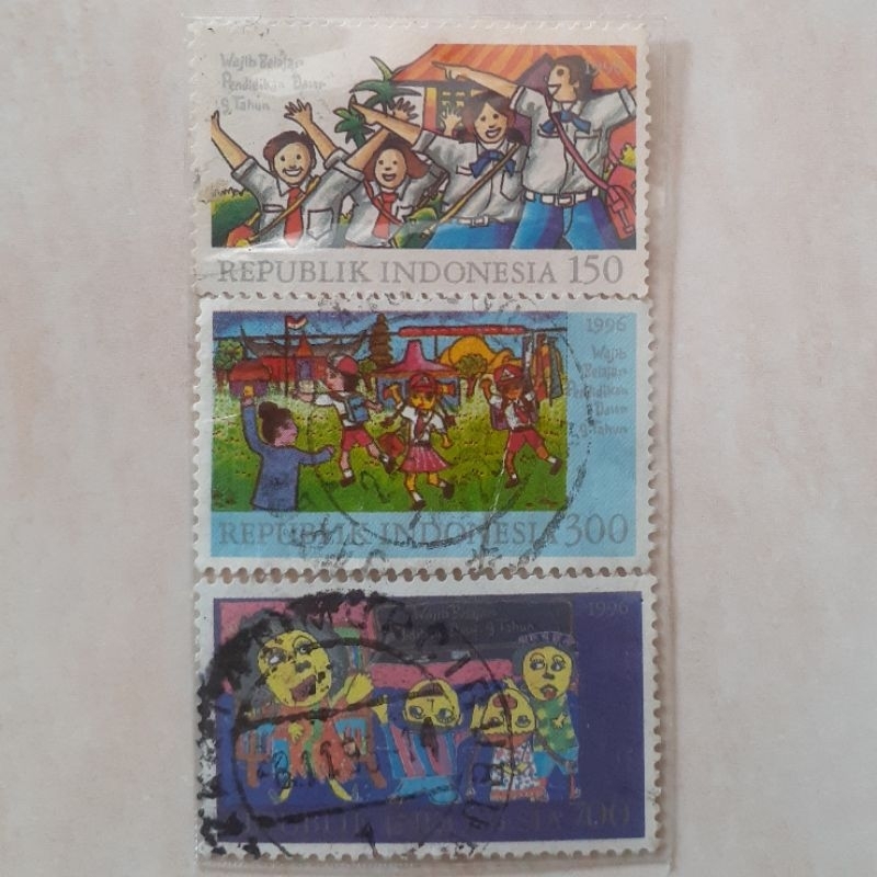 

(A) Perangko Indonesia Wajib Belajar Pendidikan Dasar 9 Tahun Tahun 1996 set lengkap 3pcs