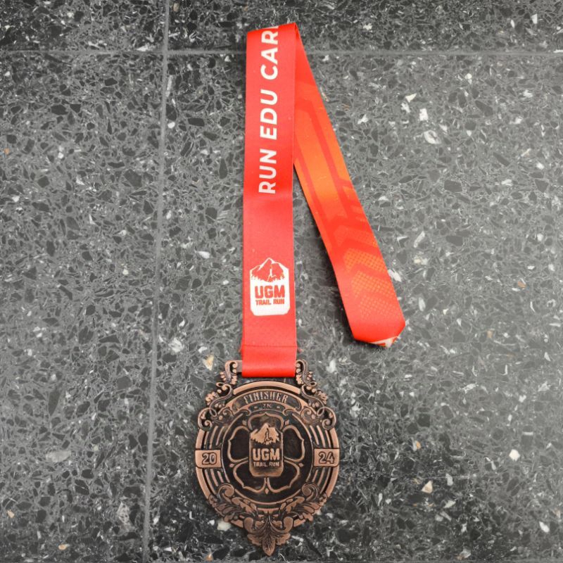 Medali Finisher Event Running Lari UGM TRAIL RUN 2024