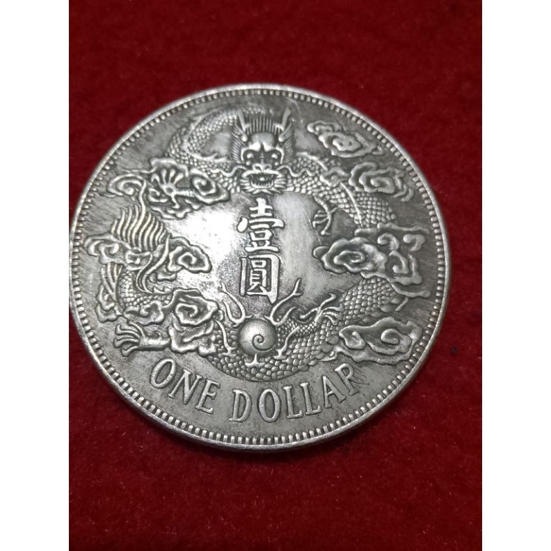koin china one dollar