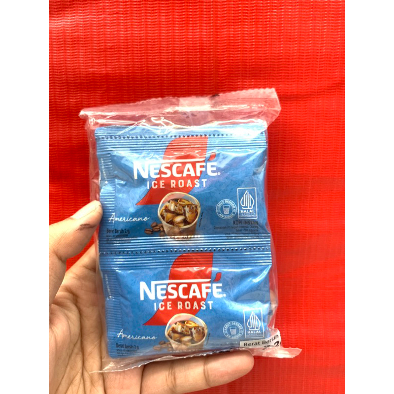 

NESCAFE ICE ROAST americani kopi hitam renteng isi 10