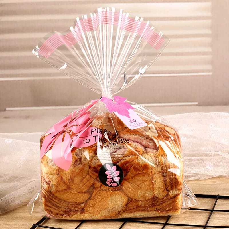 

plastic goodie bag transparan sakura / kantong cookies / kantong bungkus kue/kantong roti