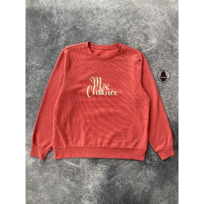 Crewneck merah sherpa dalam