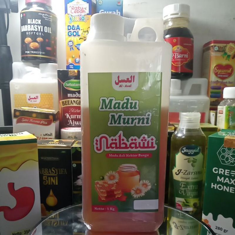 

MADU MURNI ASLI EKTAR BUNGA RANDU 1KG BERKUALITAS KADAR AIR 18-20%