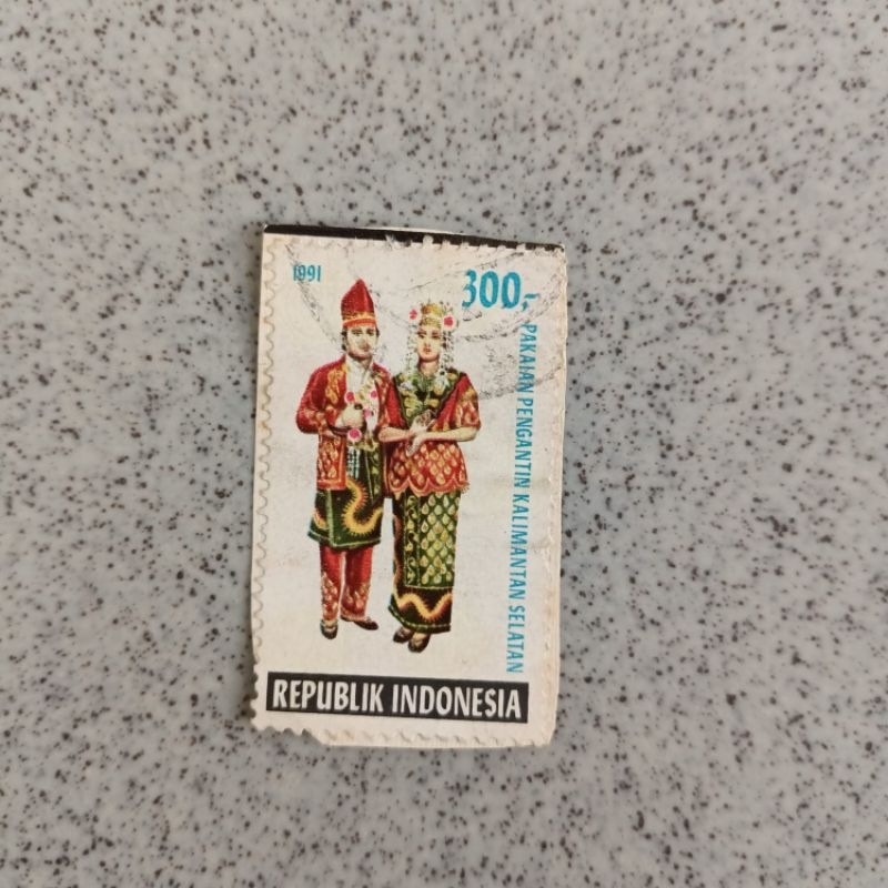 

Perangko Indonesia used Pakaian pengantin daerah seri 5