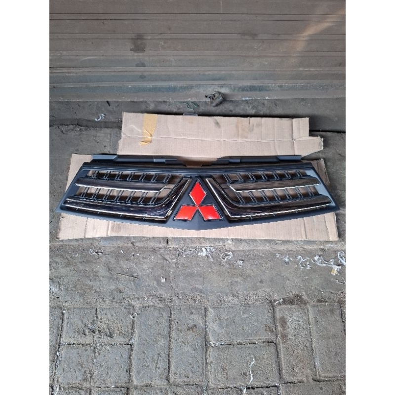 grill pajero sport dakar 2014 original