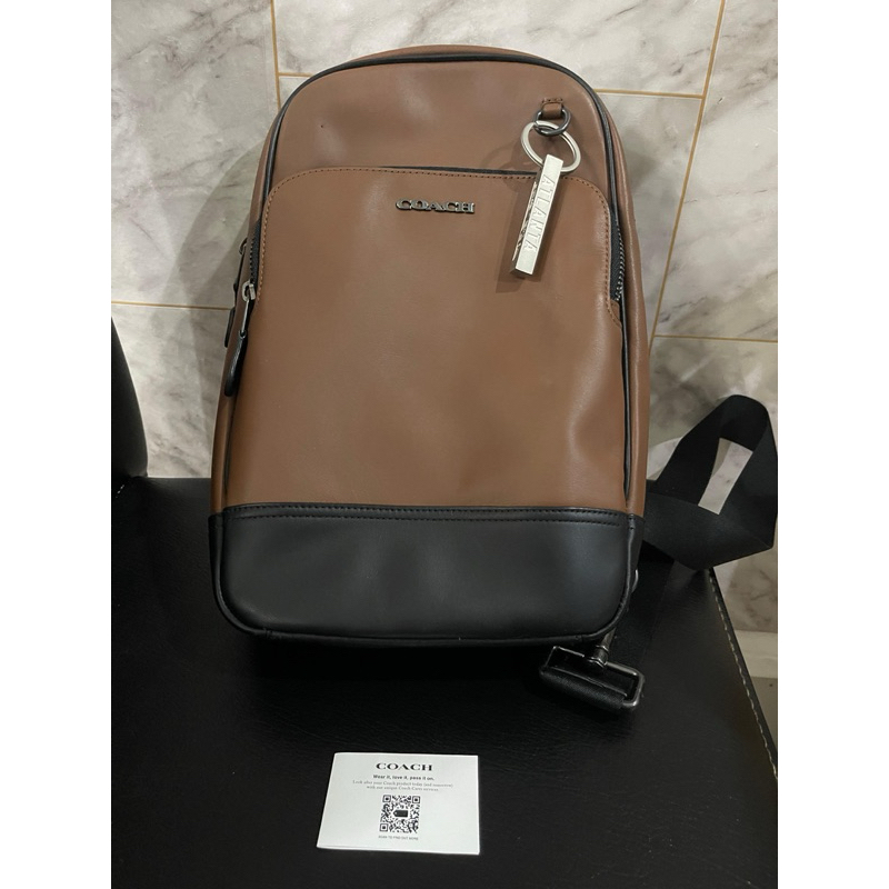 coach graham sling bag saddle