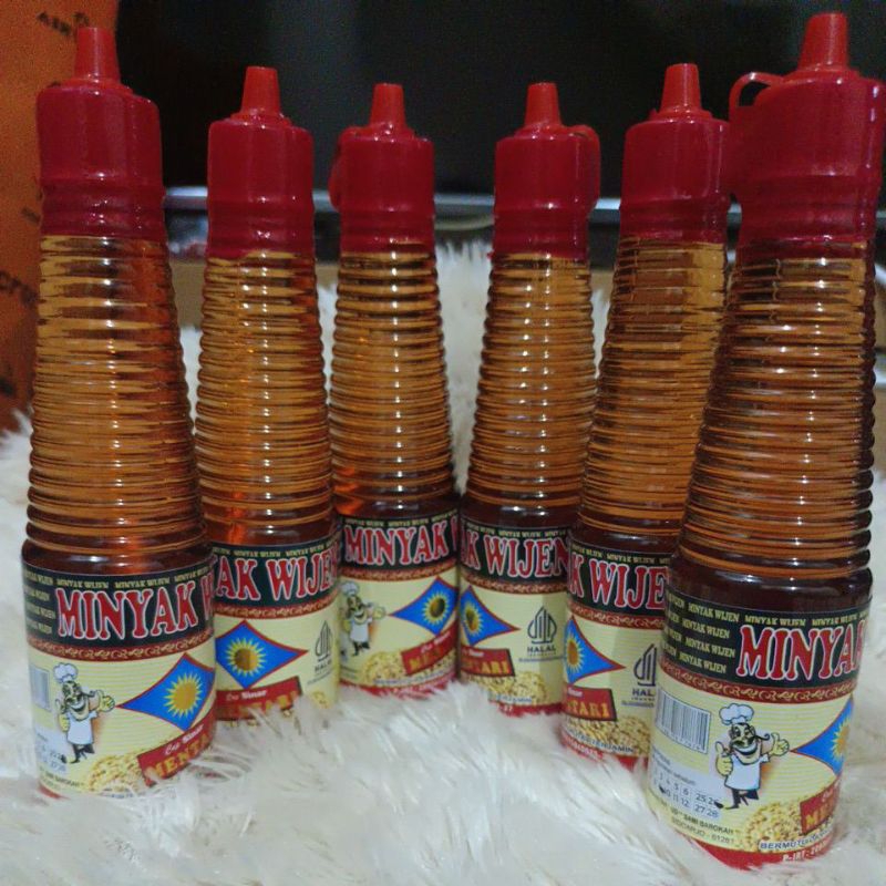 

minyak wijen isi 6 botol @150ml,cap sinar mentari