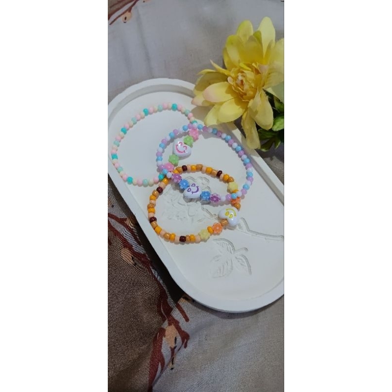 gelang manik manik smile