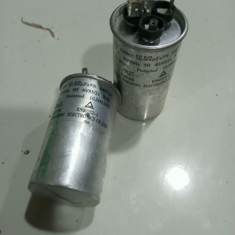 Kapasitor ac panasonic 12,5/2uf 1/2pk r32 original cabutan