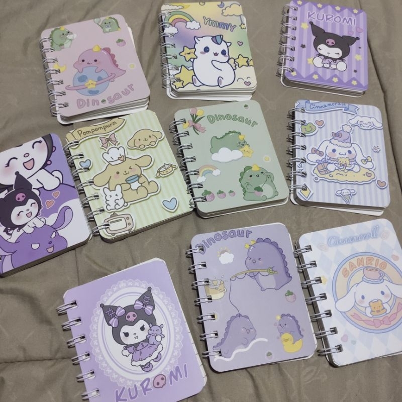 

buku tulis mini A7 motif kartun lucu, notebook mini A7 banyak karakter . ukuran 8,1 x 10,5