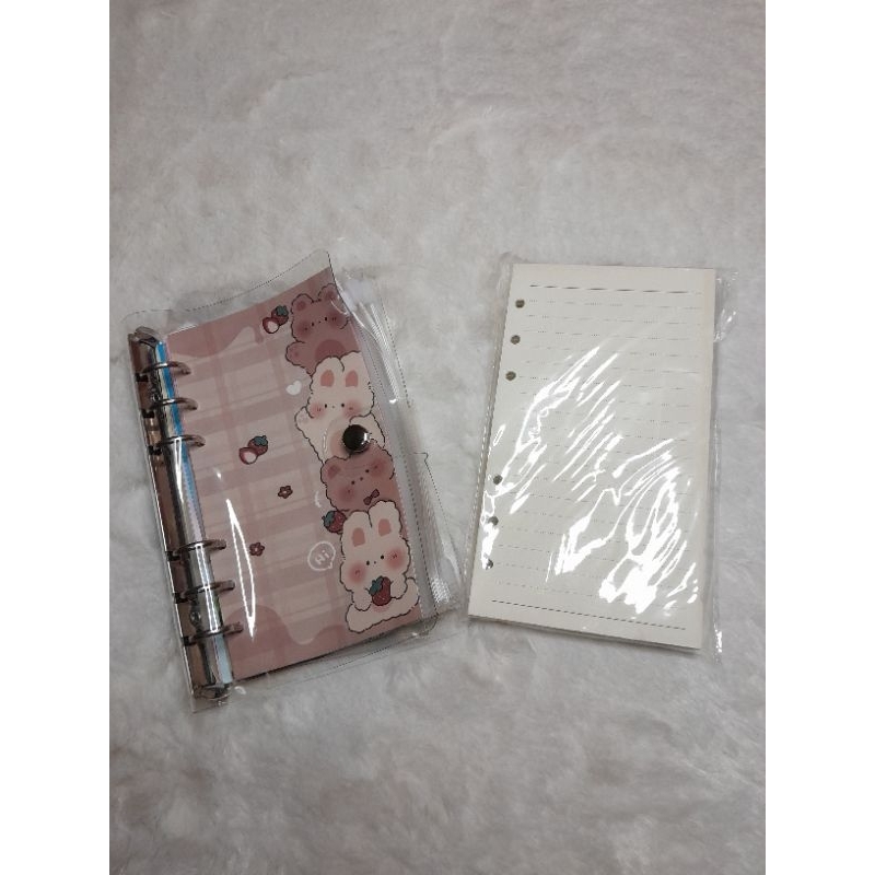 

Binder A6 Bening dengan ziplock & kertas menabung kalender