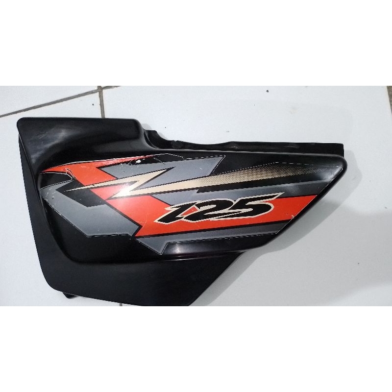 bok aki samping thunder 125 samping kiri original