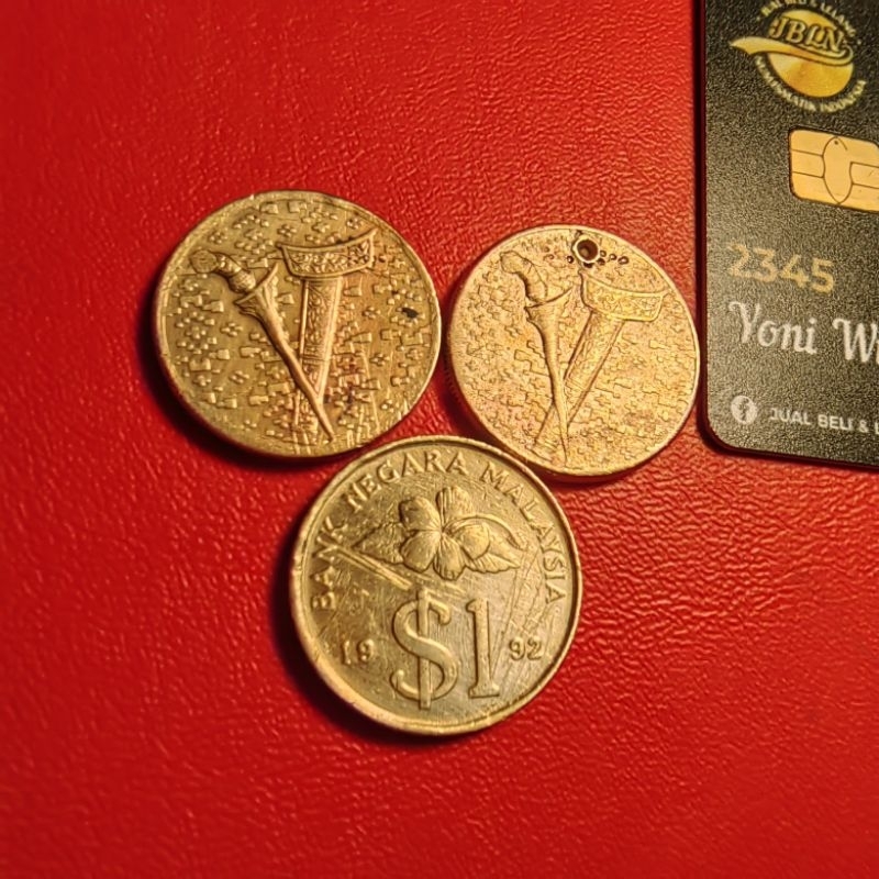 koin kuno 1 ringgit keris ada baret dan lubang